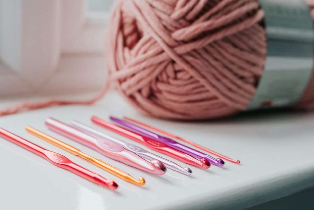 a ball of yarn and a crochet hook