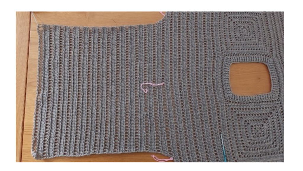 Instructions for Sizes XS, S, XL, 2X Row 1 (R1):Start with 3 chains (ch3). Work 2dc and close the 3 loops tog. Continue with double crochet stitches (dc) until you are 3 stitches before the left stitch marker. Close the last 3 stitches with a triple crochet decrease (3dc-tog). Row 2 (R2):Start with 1 chain (ch1). Alternate slip stitches (sl st) and half-double crochets (hdc) along the row.Finish with a slip stitch (sl st). Row 3 (R3):Start with 3 chains (ch3). Skip one stitch and work 1 double crochet (dc).Close together. Repeat the pattern ch1-1dc along the row, skipping one stitch between each point. In the last 4 stitches, work: ch1, skip one stitch, 2dc-tog with one stitch left free between the two points. Row 4 (R4):Start with 1 chain (ch1). Alternate slip stitches (sl st) and half-double crochets (hdc) along the row.Finish with a slip stitch (sl st). Repeating the Pattern:From Row 5 onwards, repeat the cycle from Row 1 to Row 4 without decrease. . Total Number of Rows: XS: 50 rows (38 cm). S: 52 rows (39.5 cm). XL: 56 rows (42.5 cm). 2X: 58 rows (44 cm). Instructions for Sizes M, L Row 1 (R1):Start with 3 chains (ch3). Skip one stitch and work 1 double crochet (dc). Close the last two double crochet stitches of the row together. Repeat the pattern ch1-1dc along the row, skipping one stitch between each point. In the last 4 stitches, work: ch1, skip one stitch, 2dc-tog with one stitch left free between thetwo points. Row 2 (R2):Start with 1 chain (ch1). Alternate slip stitches (sl st) and half-double crochets (hdc) along the row.Finish with a slip stitch (sl st). Row 3 (R3):Start with 3 chains (ch3). Work 2 double crochet stitches together (2dc-tog) into the next stitch. Continue with double crochet stitches (dc) until you are 3 stitches before the left stitch marker. Close the last 3 stitches with a triple crochet decrease (3dc-tog). Row 4 (R4):Start with 1 chain (ch1). Alternate slip stitches (sl st) and half-double crochets (hdc) along the row.Finish with a slip stitch (sl st). Repeating the Pattern: From Row 5 onwards, repeat the cycle from Row 1 to Row 4. Stop decreasing in rows with double crochet (dc) and mesh pattern (1dc-1ch). Total Number of Rows: M: 54 rows (41 cm). L: 56 rows (42.5 cm).