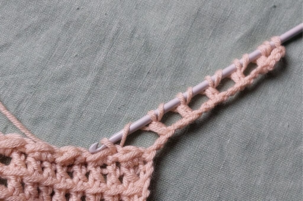 Closing the Loops: To finish, close all the loops two at a time until you have only one loop left on the hook.