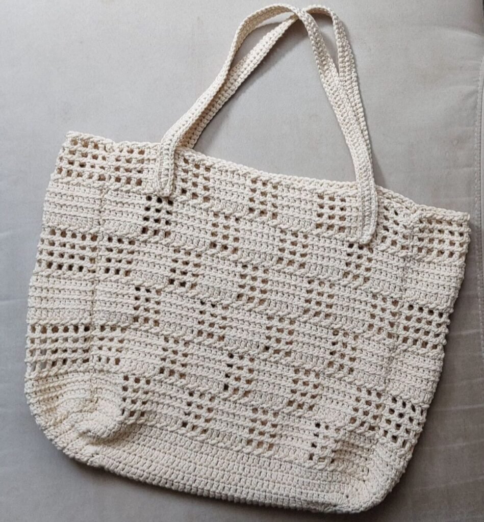 Handmade crochet Checkmate Bag featuring a checkerboard pattern