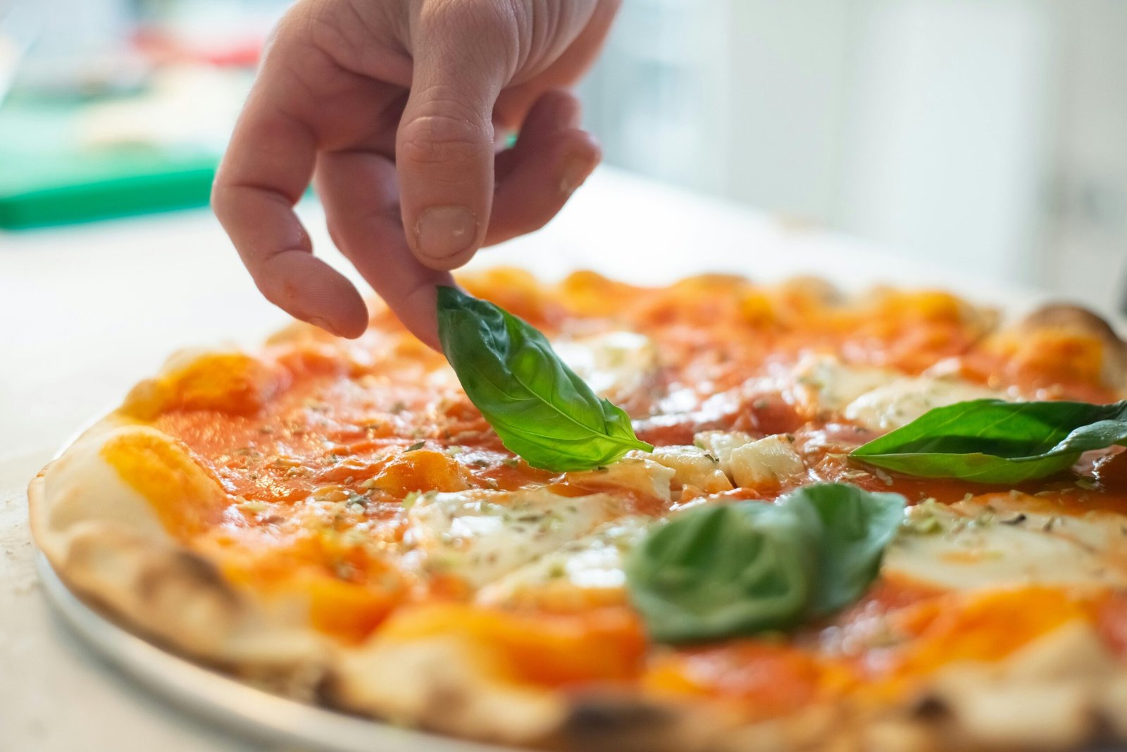 Homemade pizza with fresh toppings, perfect for slow living meal.